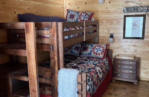 Greers Ferry Cabin | Lakeside Lodge for family fun with game room and covered deck! Fish & Swim!