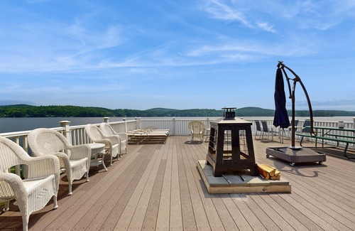 Alton Bay House | Lakeside paradise w/lakefront deck, enclosed porch, 2 docks & large lawn