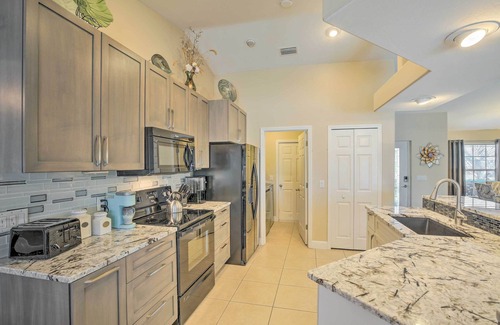 Trafalgar House | Lanai & Heated Pool: Stunning Cape Coral Getaway