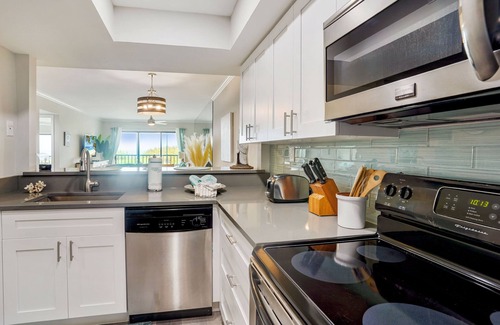 Sunset Beach Condo | Land's End 203 building 10 Beautiful Beachfront Remodel -Next to Pool