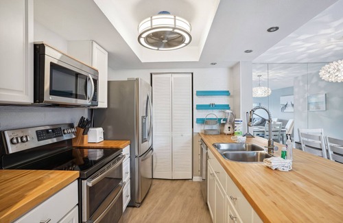 Sunset Beach Condo | Land's End 306 bldg 1| Stunning Views| Amenities|