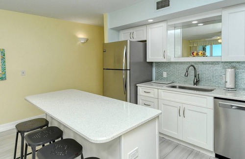 Longboat Key Apartment | LaPlaya 103A-Time to relax! Enjoy the peaceful, private beach just a shell's throw from your door.