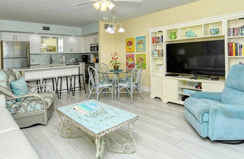 Longboat Key Apartment | LaPlaya 103A-Time to relax! Enjoy the peaceful, private beach just a shell's throw from your door.