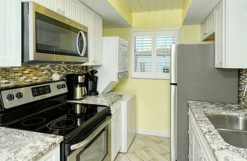 Longboat Key Apartment | LaPlaya 105B-Relax on the balcony and watch the dolphins swim by and the pelicans dive!