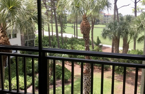 Bonita Bay Condo | LARGE 3RD. FLOOR CORNER UNIT W/GOLF COURSE VIEWS FROM SPACIOUS WRAP AROUND LANAI