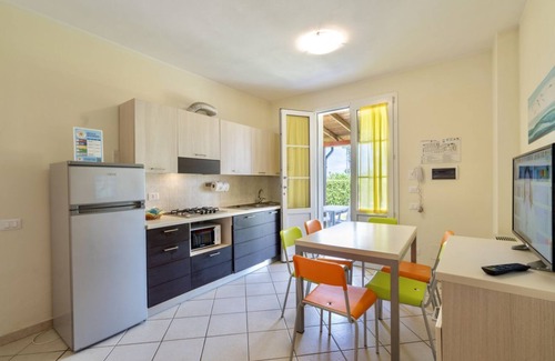 Vada Apartment | Large apartment on two levels of 61 m2 composed on the ground floor of a living room with satellite TV, equipped kitchenette, fridge with freezer, microwave oven and dishwasher.Double bedroom, double sofa bed and bathroom.On the first floor we find a bed
