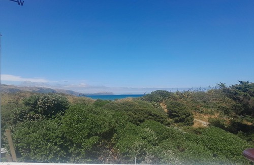 Raumati South House | Large beach house with beautiful views access into QE2 park and to the beach.