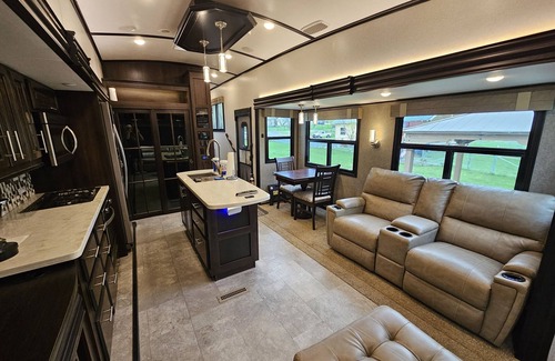 Riggins House | Large Camper Massage seats cornhole Backyard Parking A/C