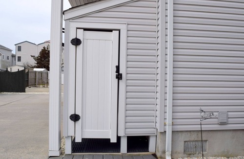 Townsend's Inlet House | Large deck off the living room with bay views. About 3 blocks to the beach.