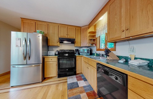 Gilmanton Hotel | Large dog-friendly home on Manning Lake with deck, lake views, dock, 4 kayaks