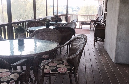 Dundee House | Large Lakefront Reunion And Retreat Home With a large lawn and wrap around porch