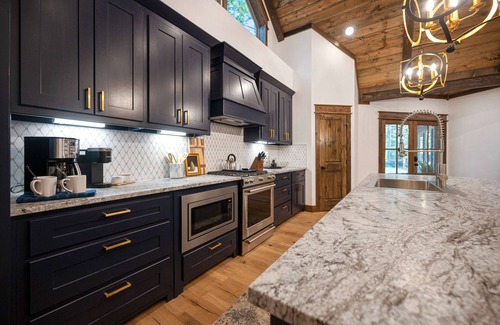 Broken Bow House | Large luxury cabin with hot tub deck. Fan-cooled patio and comfy seating.