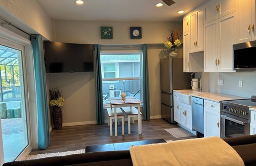 Bay Harbor Estates House | Large on-suite 1-bedroom unit in a waterfront house located on a canal