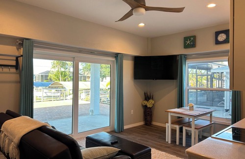 Bay Harbor Estates House | Large on-suite 1-bedroom unit in a waterfront house located on a canal