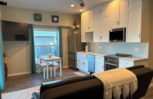 Bay Harbor Estates House | Large on-suite 1-bedroom unit in a waterfront house located on a canal