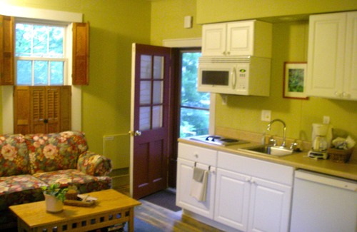 Frankfort House | Large studio suite w/private back porch entrance one block from the beach.