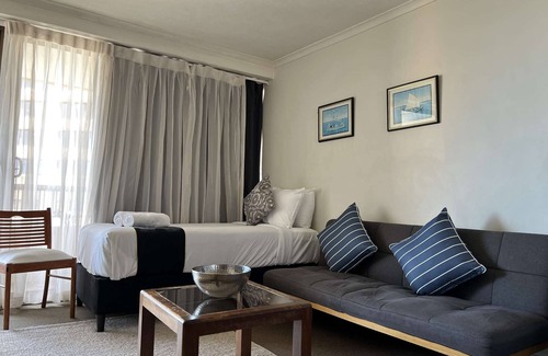 Darlinghurst Apartment | Large Sydney City Studio with Balcony & Oxford St Views