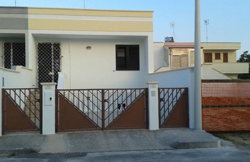 Torre San Giovanni Apartment | Large terraced house just renovated, with air conditioner in the room