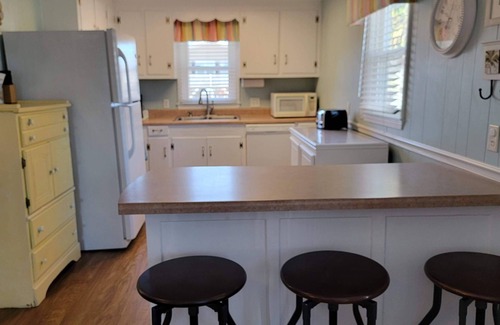 North Myrtle Beach House | Large yard with water access & floating dock/kayak launch. One block from beach