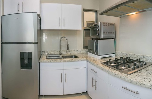 Luis Donaldo Colosio Apartment | Las Palmas In Alizes - Modern 1 Bedroom By the Beach with Fast reliable internet