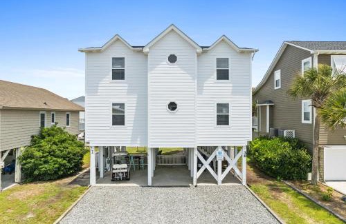 Ocean Isle Beach House | Latitude Adjustment by Brunswick Vacation Rentals Canal front with dock