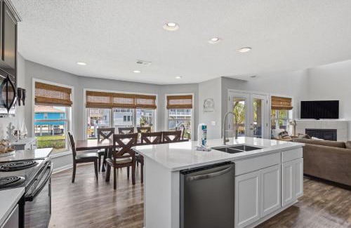 Ocean Isle Beach House | Latitude Adjustment by Brunswick Vacation Rentals Canal front with dock