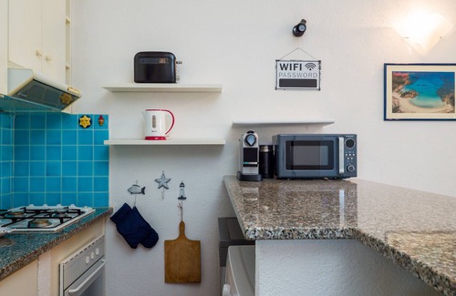 Porto San Paolo Ski Chalet | Laura's Terrace - terraced house with seaview