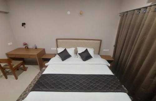 Nedumbassery Apartment | Lavender Airport suits
