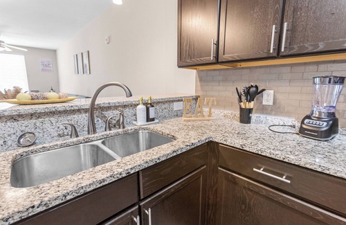 Five Points South Apartment | Lavish one bedroom apartment in downtown Birmingham with rooftop stadium views.