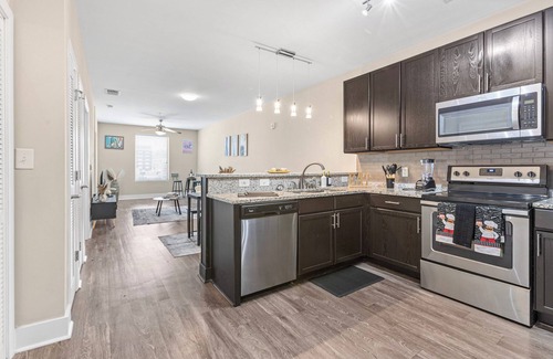 Five Points South Apartment | Lavish one bedroom apartment in downtown Birmingham with rooftop stadium views.