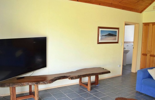 Hat Head House | Lazy Choose-Day is a delightful three-bedroom holiday home in the heart of picturesque Hat Head.