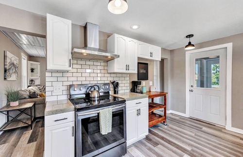 Oconto House | Lazy River Villa - Hottub! Fenced Yard! Sleeps 13!