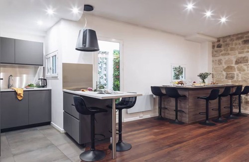 Saint-Merri Apartment | Le Marais: Where Paris Wears Its Soul-A Chic Parisian Hideaway/Triplex+Patio+A/C