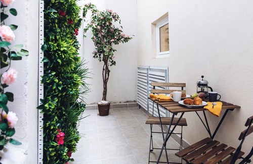 Saint-Merri Apartment | Le Marais: Where Paris Wears Its Soul-A Chic Parisian Hideaway/Triplex+Patio+A/C