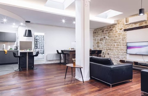 Saint-Merri Apartment | Le Marais: Where Paris Wears Its Soul-A Chic Parisian Hideaway/Triplex+Patio+A/C