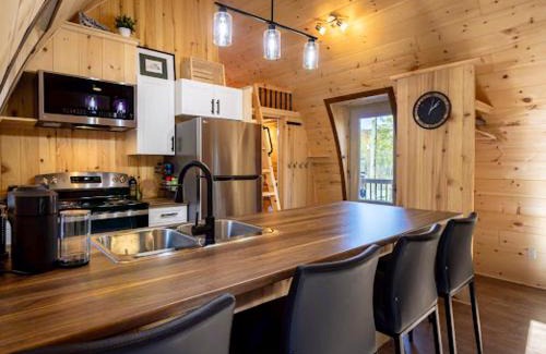 Adstock Ski Chalet | Le POD du Mont ADSTOCK spa ski motoneige VTT plein air arcade