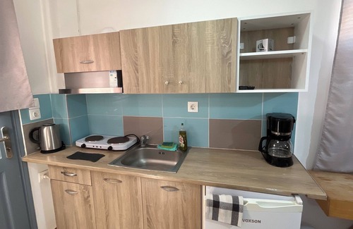 Emporio Hotel | Leon Lux Apartment, quadruple room with private bathroom.