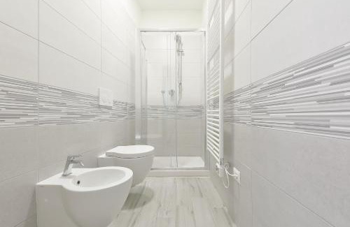Centro Urbano Apartment | LHE Les Trois Merveilles - Grey Lewis