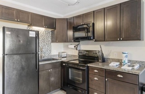 Carolina Beach Condo | Life's a Beach - walk to everything in historic Carolina Beach! by RedAwning