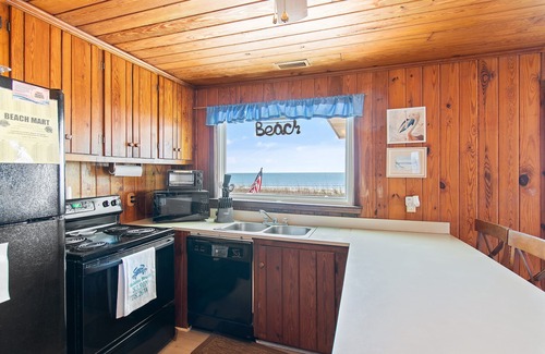 Supply House | "Lifesaver" is a 2 Bedroom, 1 Bathroom, Oceanfront Home!