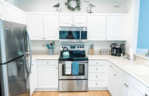 Bradenton Beach House | Light & Airy Townhome with Beach, Bay, & Pool views from deck!
