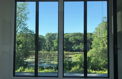 Cohasset House | Light and Power Co. modern industrial located in picturesque Cohasset Ma.