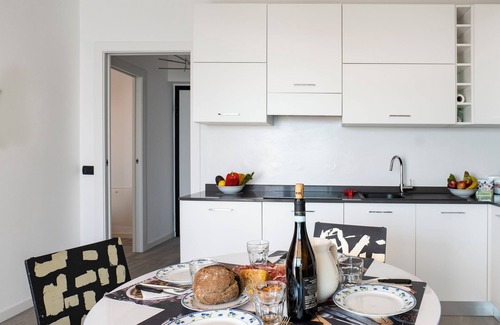 Parzanica Apartment | Lights on the Lake one-bedroom apartment with rooftop terrace and lake view pool