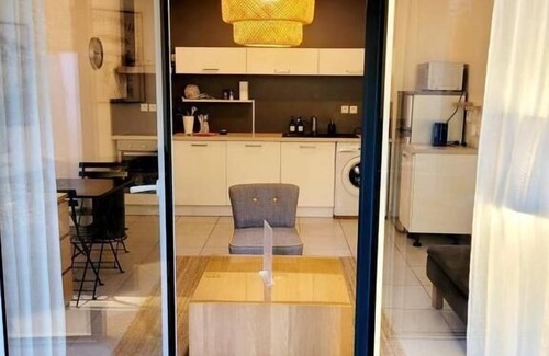 Waldeck-Sully Apartment | Lil Bretech: Terrace and covered parking