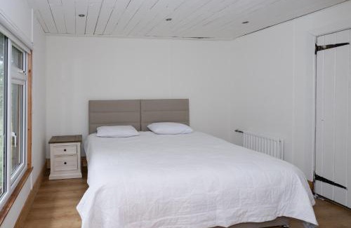 Maghera House | Lilly Lodge; nestled within the forest.
