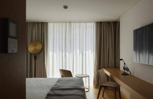 Sao Jorge de Arroios Hotel | Lisbon’s Light Show Awaits: Relax Poolside After City Wanders