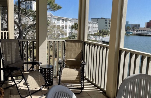 Cherry Grove Beach Condo | Listen to ocean waves from this beautifully updated condo with a lake view!