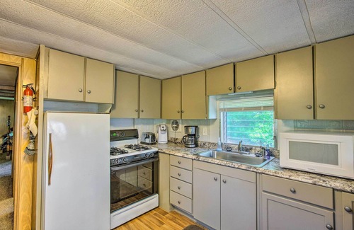 Irons Cabin | Little Manistee Riverfront Cabin w/Fire Pit!
