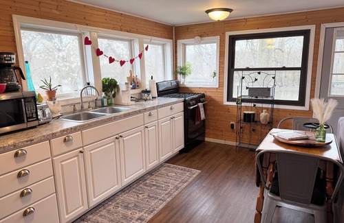 Stockland House | Little River House on Henry, on the serene banks of the Iroquois River