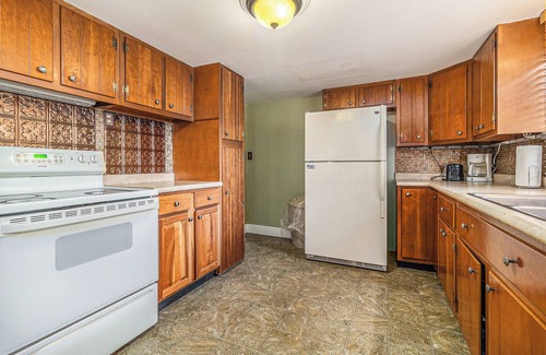 Ludington Apartment | Located 1 block from Ludington Beach